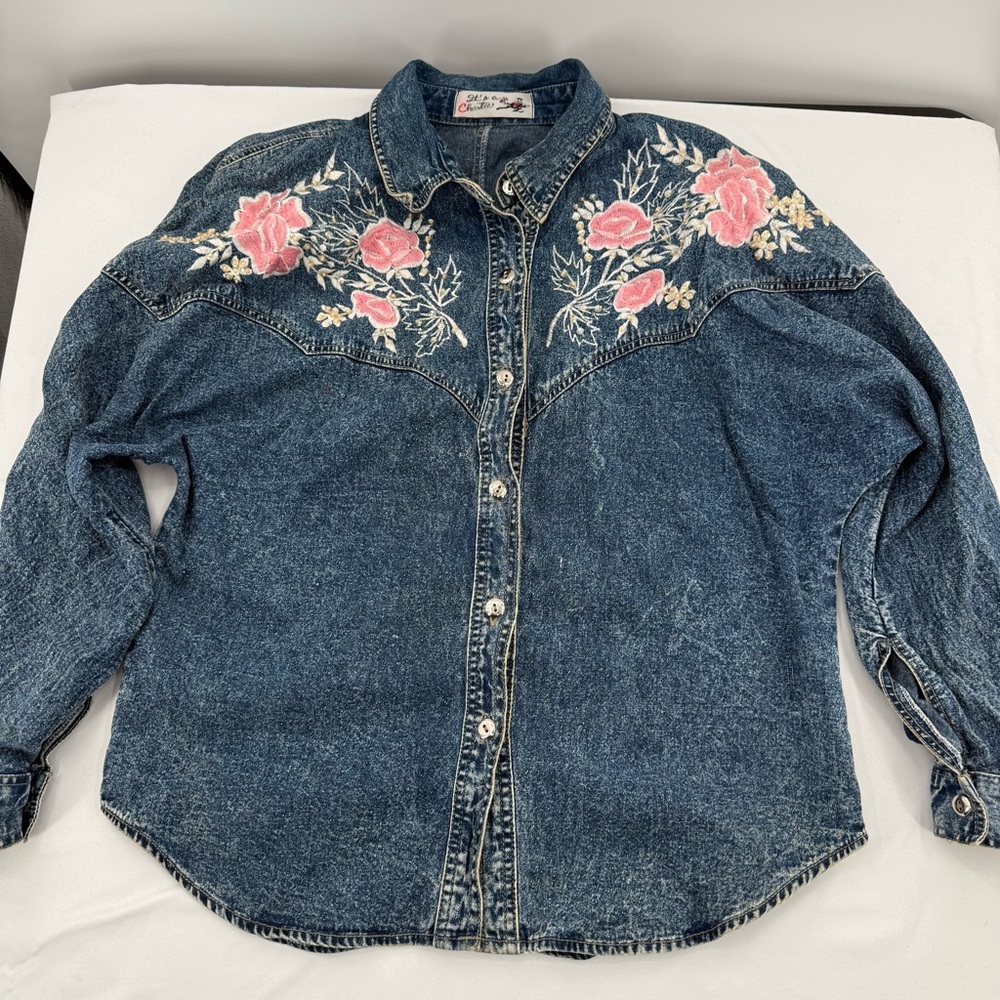 It’s a Charlie Denim Shirt with Pink Floral Embroidery